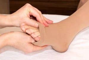 open toe compression stockings for the legs, ankles, and feet.