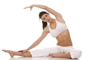 A woman stretching to help her varicose vein symptoms